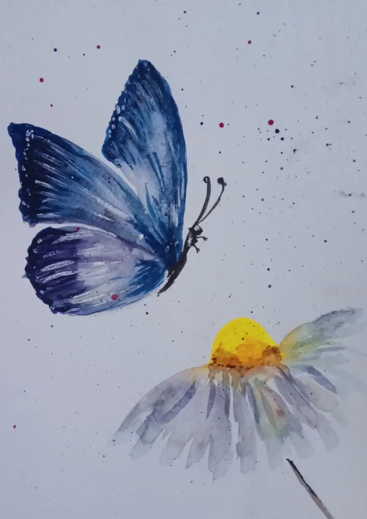 A butterfly hovers in anticipation beside a blooming flower—two kindred spirits poised to reunite, ready to splash the day with color and quiet joy.
